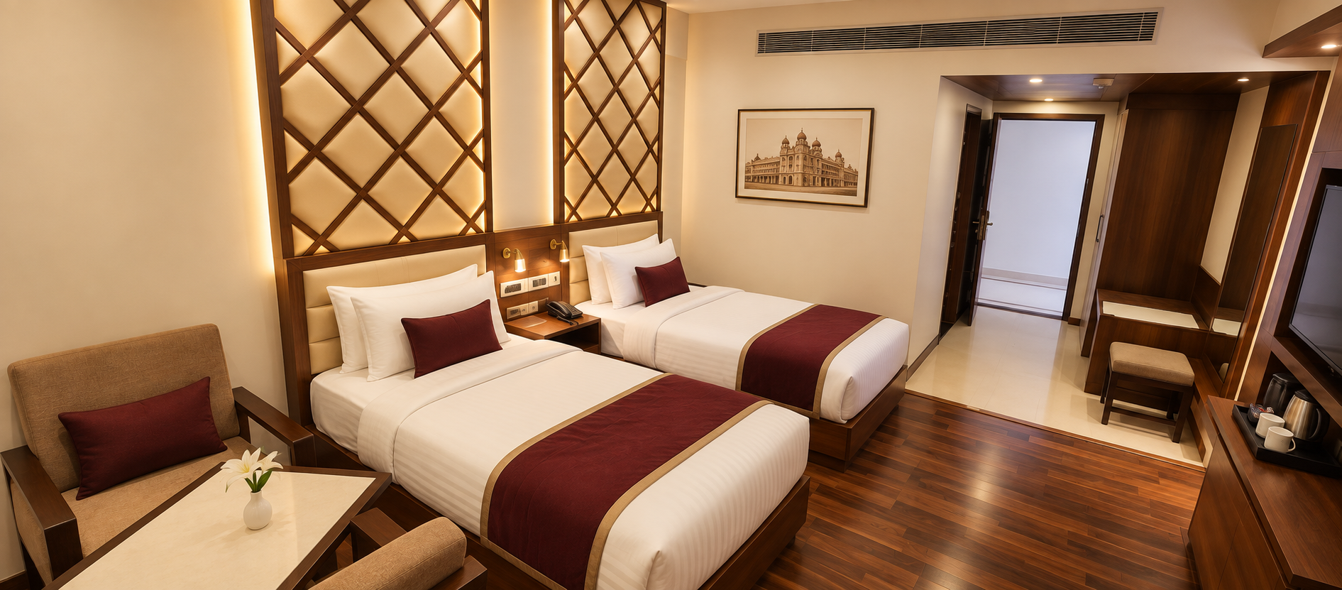 Deluxe Twin room at Hotel Preethi International, Mysuru