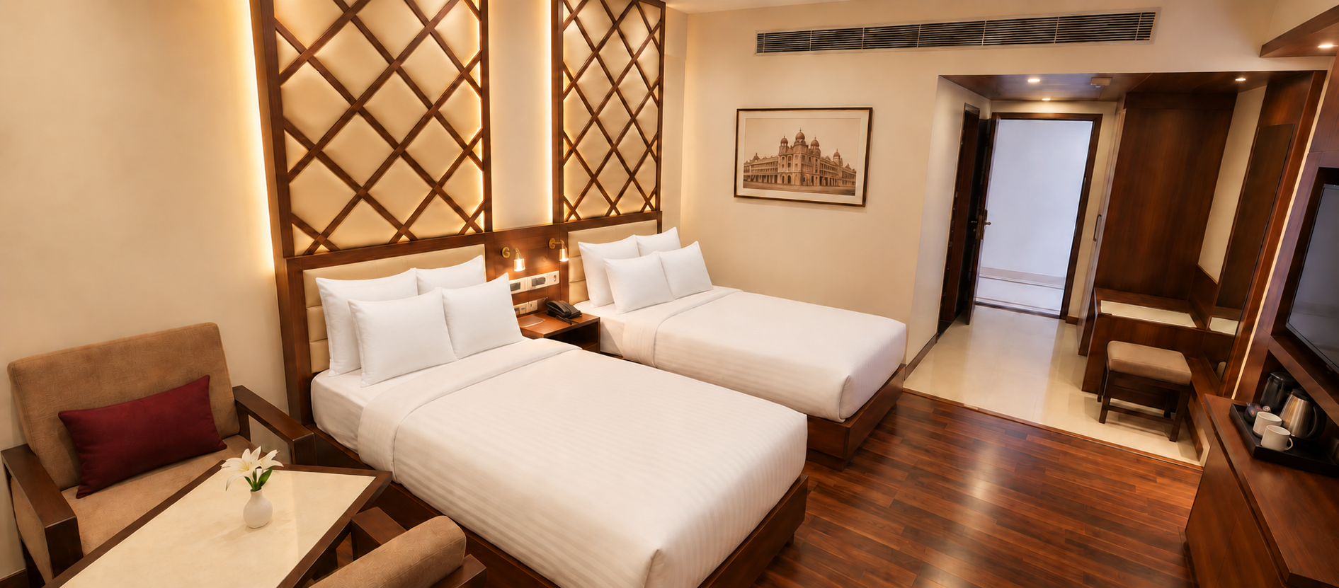 Deluxe Twin room at Hotel Preethi International, Mysuru