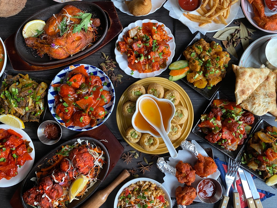 A table arranged with a variety of Indian dishes