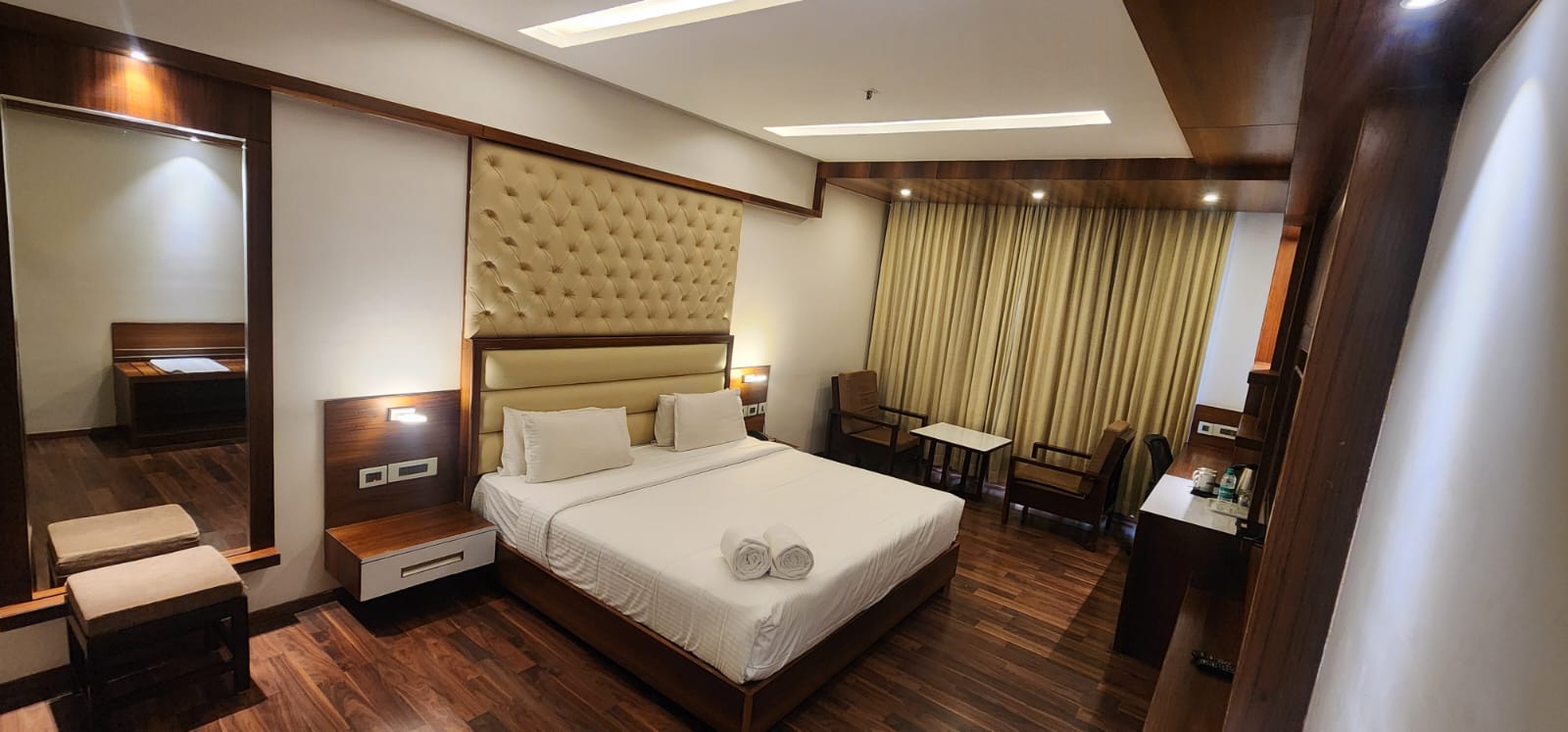 Dining space at Hotel Preethi International in Mysuru